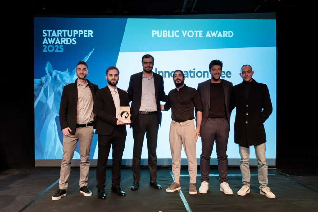 Innovation Bee receiving its Public Vote Award at the Startupper Awards